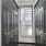 View of black closet doors on left and right