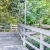 a wooden bridge with a light post