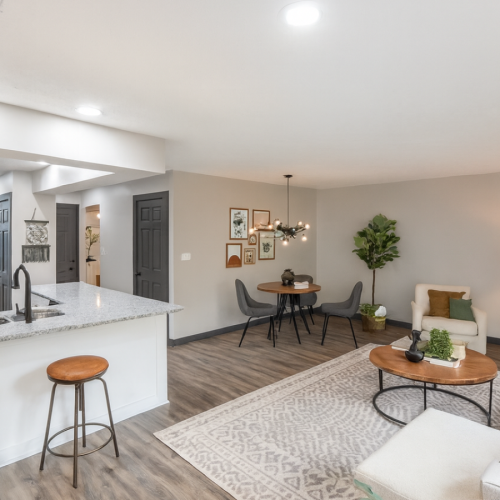 Upgraded apartments in Shady Lane near Columbus Staged apartment living and dining areas with view of kitchen