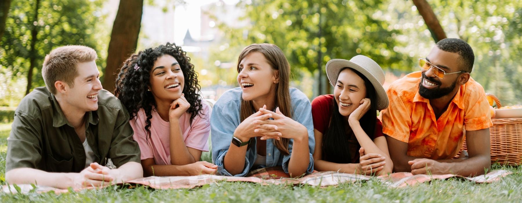 a group of people sitting on the ground