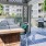 a table and chairs on a deck