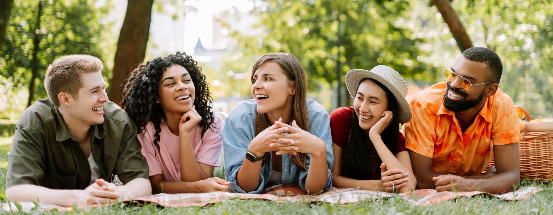 a group of people sitting on the ground